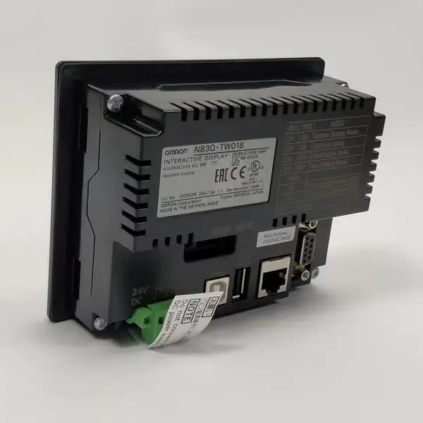 Omron NB3Q-TW01B 3.5-inch TFT HMI - front view showing the 320x240 pixel color LCD display with a sample operator screen, the analog resistive touch panel, the black bezel, and the 4 mounting brackets on the rear
