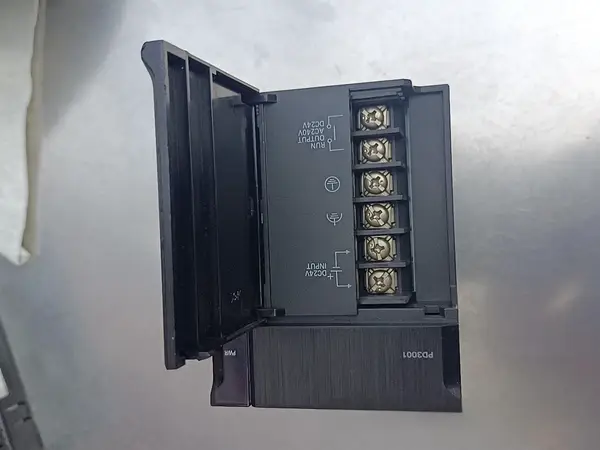 Omron NJ-PD3001 — front face showing the green PWR LED and 24 VDC input marking