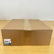 Omron NS10-TV00-V2 NS-series HMI in its shipping carton with the type label visible