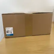 Omron NS10-TV01B-V2 NS-series HMI — side view with mounting bracket detail for panel cutout installation