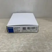 Omron NX-PD1000 NX unit power supply — left side view showing the alignment markers that engage with the previous NX Unit, and the NX-PD1000 model label