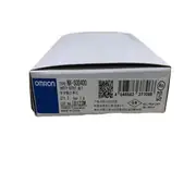 Omron NX-SOD400 safety output -- left side showing the alignment markers that key to the previous NX Unit on the DIN rail, NX-Bus connector on the rear.