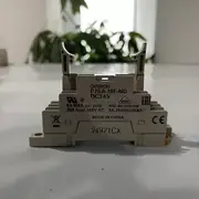 P7SA-10F-ND socket in frontal view showing the Omron P7SA-10F-ND DC 24V face label, the cULus / TUV / VDE / CE certifications, the empty retention slot at the top where a G7SA relay snaps in, and the release-lever yoke at the bottom