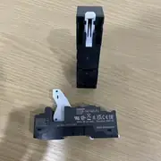 Omron P7SA-14F-ND-PU DC24 socket — installation view showing DIN-rail mounting clip on rear with coil and contact terminal layout visible from above