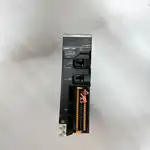 Omron R88D-1SN02H-ECT 1S servo drive — bottom showing DIN-rail mounting and grounding terminal