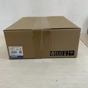 Omron R88D-1SN04H-ECT 1S series installed in a control cabinet, connected via EtherCAT to an NJ501-1500 motion controller — driving an R88M-1M40030H-S2 servo motor on a packaging-line pick-and-place axis at 1.27 Nm rated torque