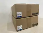 Omron R88D-1SN08H-ECT — two brown Omron cardboard shipping cartons stacked on a light surface, each showing TYPE/型号 R88D-1SN08H-ECT / AC SERVO DRIVE / 软件 版本 software Ver. 2.0 / UNIT Ver. 2.0 / MASS 2.0 kg / LOT No. 9 31724M / QTY 1 / barcode 4 547734 110708 / OMRON Corporation / MADE IN CHINA / blue OMRON band / package handling icons (handle with care, this side up, keep dry)