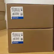 Omron R88D-KN04H-ECT-Z Accurax G5 servo drive — rear view showing the integrated heatsink fins and the backplane connector for the 24 VDC control supply, with the DIN-rail mounting clip at the rear of the chassis