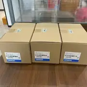 Omron R88M-1M75030H-S2 servo motor — three stacked brown shipping boxes showing consistent Omron labeling and consistent R88M-1M75030H-S2 type marking on each box