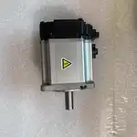 Omron R88M-K20030H-S2 servo motor — side view showing the silver metallic motor body with the black cable connector cover at the top