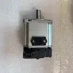 Omron R88M-K20030H-S2 servo motor — side profile showing the black encoder connector end at the bottom with a 3-pin power/encoder plug visible