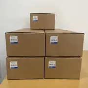 Omron R88M-K2K030H-S2-Z servo motor — five sealed cardboard shipping boxes stacked with Omron labels showing TYPE R88M-K2K030H-S2-Z, AC SERVO MOTOR, QTY 1, MADE IN CHINA