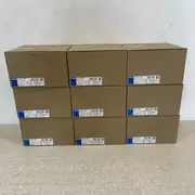 Omron S8VK-C24024 — nine sealed cartons stacked three-by-three with labels visible