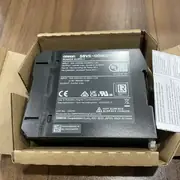 Omron S8VK-G06024 24 VDC PSU - top view showing the model-number label with 'S8VK-G06024' designation, 5-year warranty marking, and the wiring diagram printed on the housing