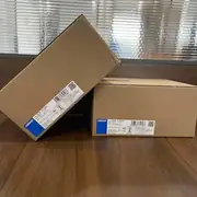 Omron S8VK-T12024 — two cartons arranged to show both identification labels
