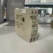 Omron S8VS-01505 — angled housing showing covered screw terminals and DC ON and DC LOW indicators