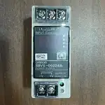 Omron S8VS-06024A 60 W 24 VDC 2.5 A PSU — front view showing the 4-digit 7-segment indication monitor (switchable between output voltage, output current, peak-hold current, maintenance forecast %, total run time), the green DC ON LED, and the input/output terminal blocks