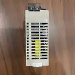 Omron S8VS-06024A mounted on a DIN rail in a small PLC control panel — powering a CP1L-EM40DT1-D PLC and 4 expansion I/O modules, with the maintenance-forecast display showing '95%' remaining electrolytic cap life (early-life stage)