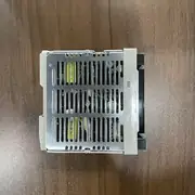 Omron S8VS-12024AP — ventilated metal cover with internal components visible through the slots
