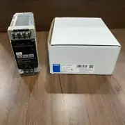 Omron S8VS-12024AP — supply beside its carton with display and screw terminals visible