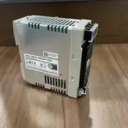 Omron S8VS-12024AP — rear label side showing model markings and rail clip
