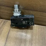 Omron Z-15GQ55-B basic switch — front face of the panel-mount body showing the threaded plunger barrel, the M3.5 screw terminals, and the Omron / Z-15G marking