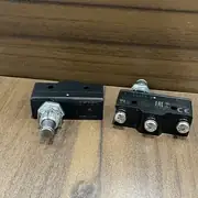 Omron Z-15GQ55-B basic switch — top-down profile showing the overtravel plunger protruding 5.5 mm from the housing face when fully depressed